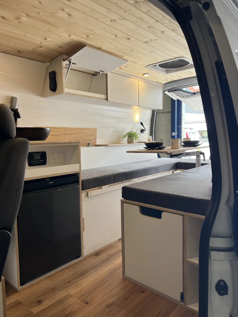 Toyota Hiace interior — kitchen and fridge