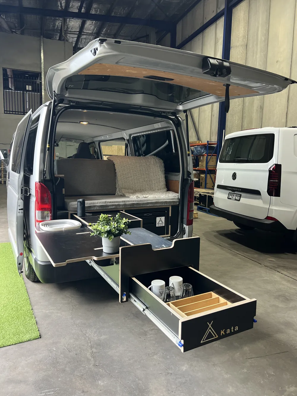 Toyota Hiace rear kitchen with folding table set up