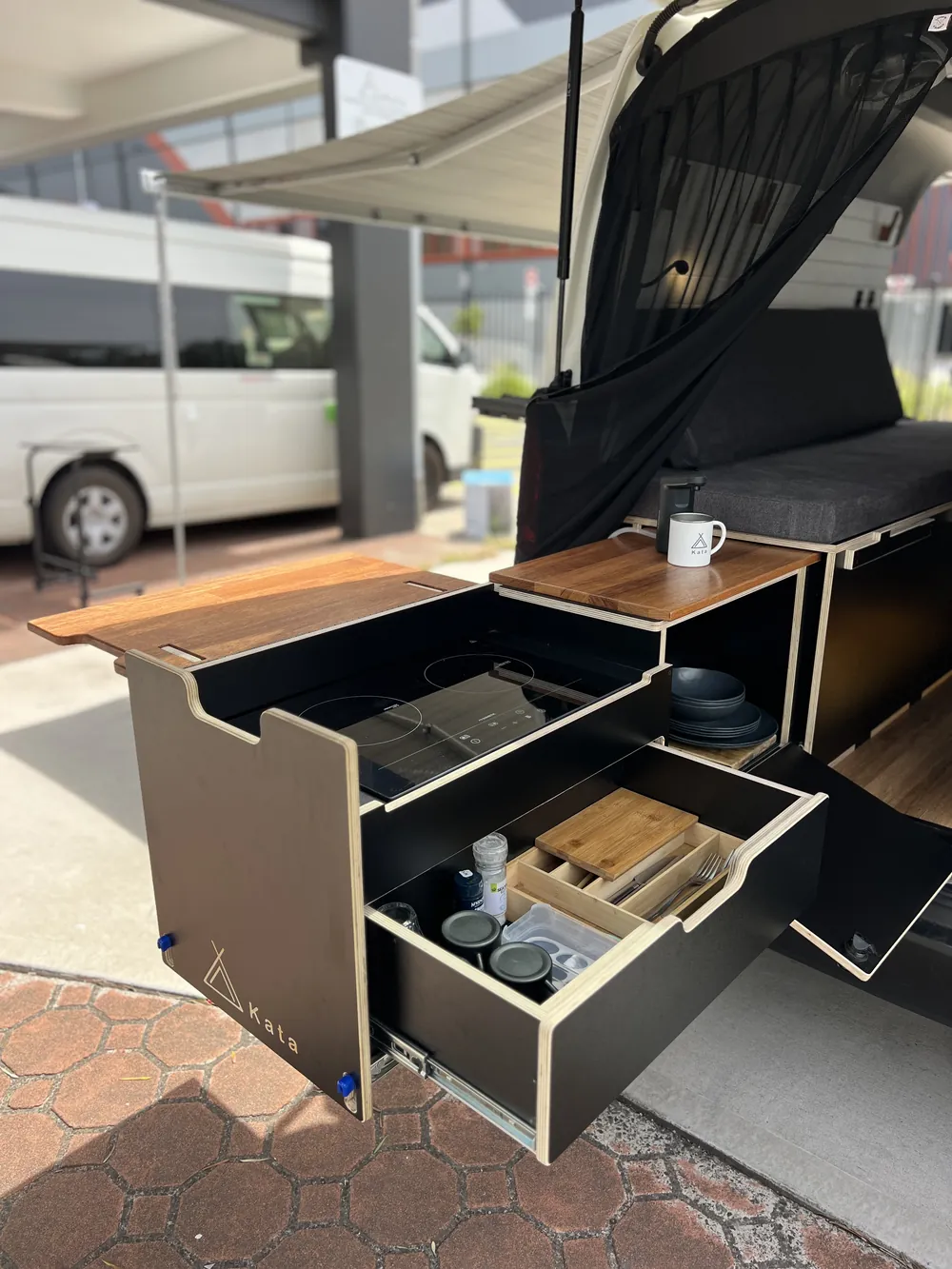 Kata Surfbox build in a Toyota Hiace with table extended