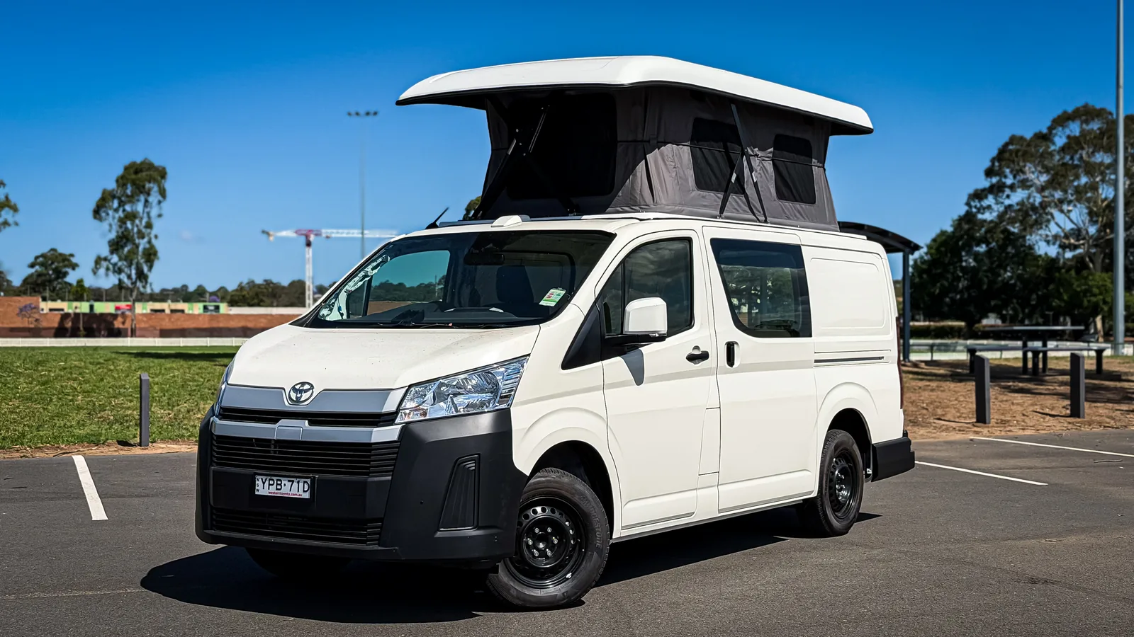 Toyota HiAce with the Kata pop-top roof raised