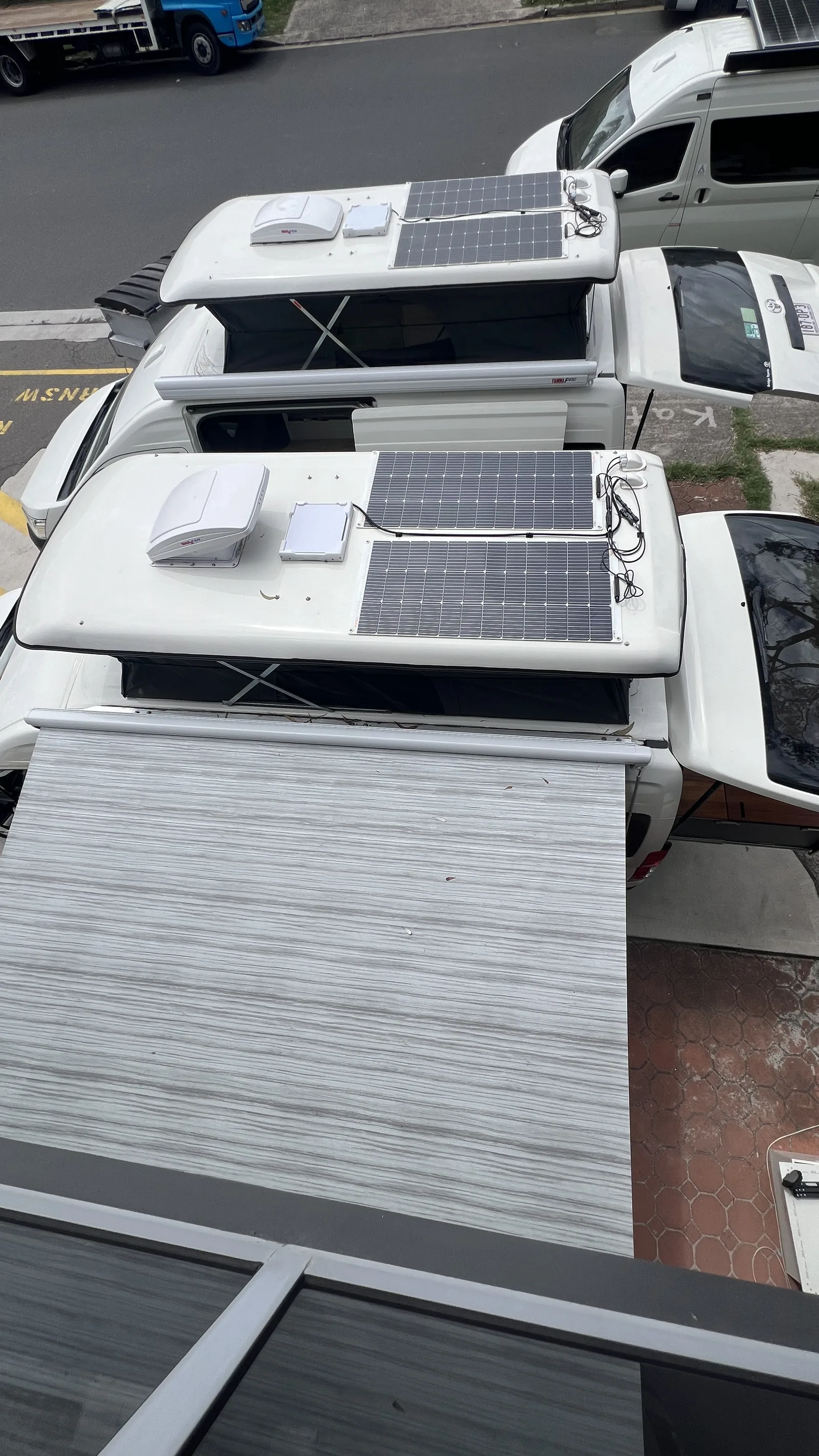 Roof-mounted 200W solar panel and Max Fan on the pop-top